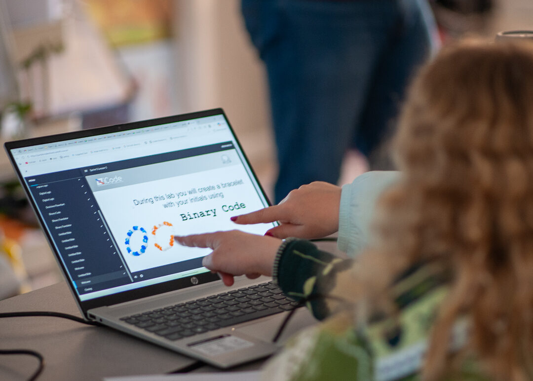Student reviewing a coding project dashboard